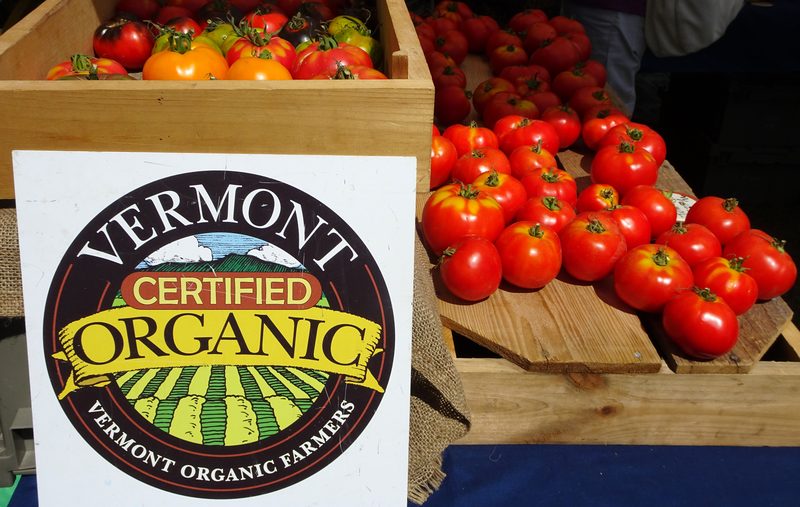 Organic tomatoes with Vermont Certified Organic sign at the market